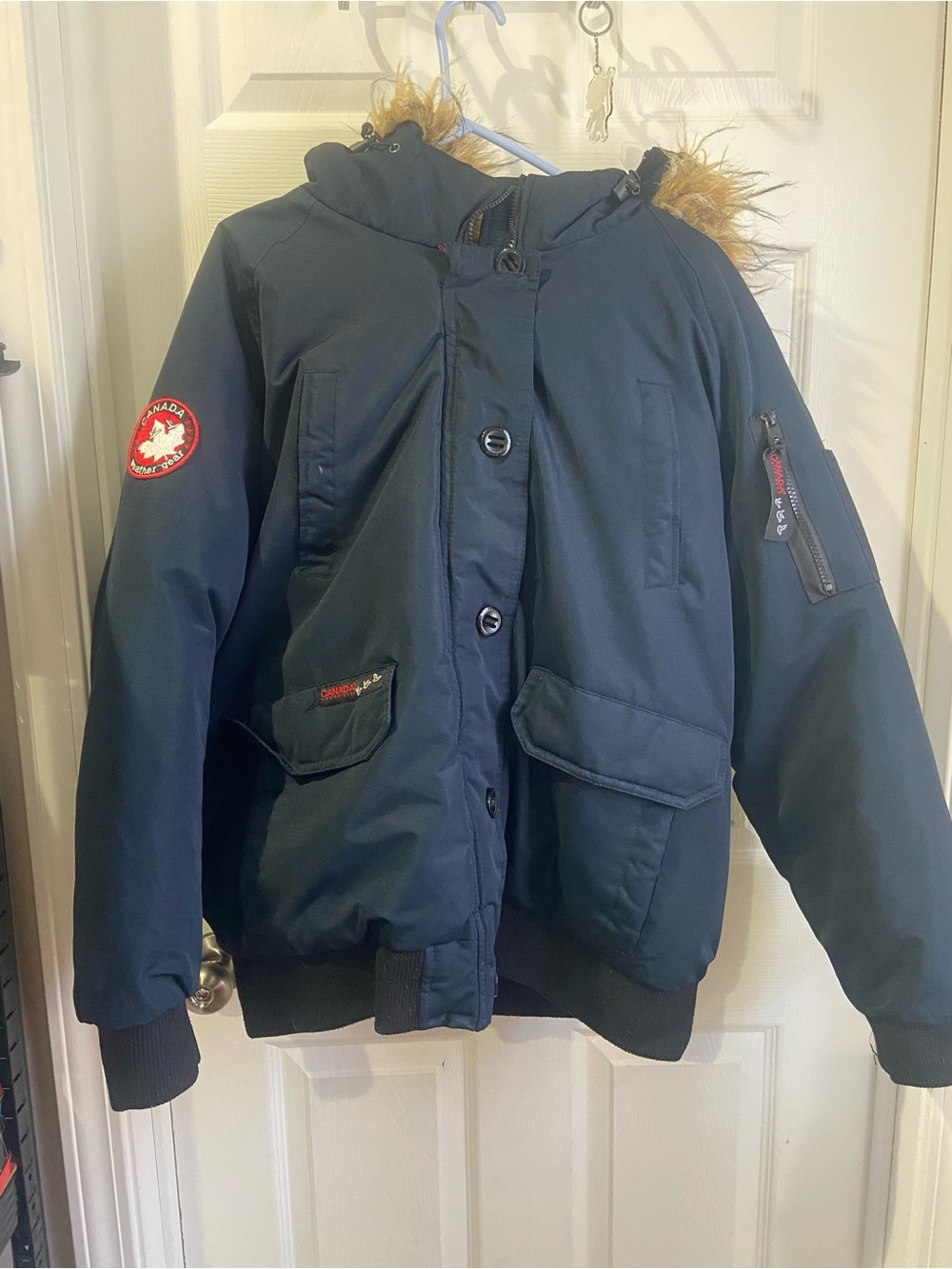 Canada Weatherproof Navy Puffer Jacket with Faux-Fur Hood